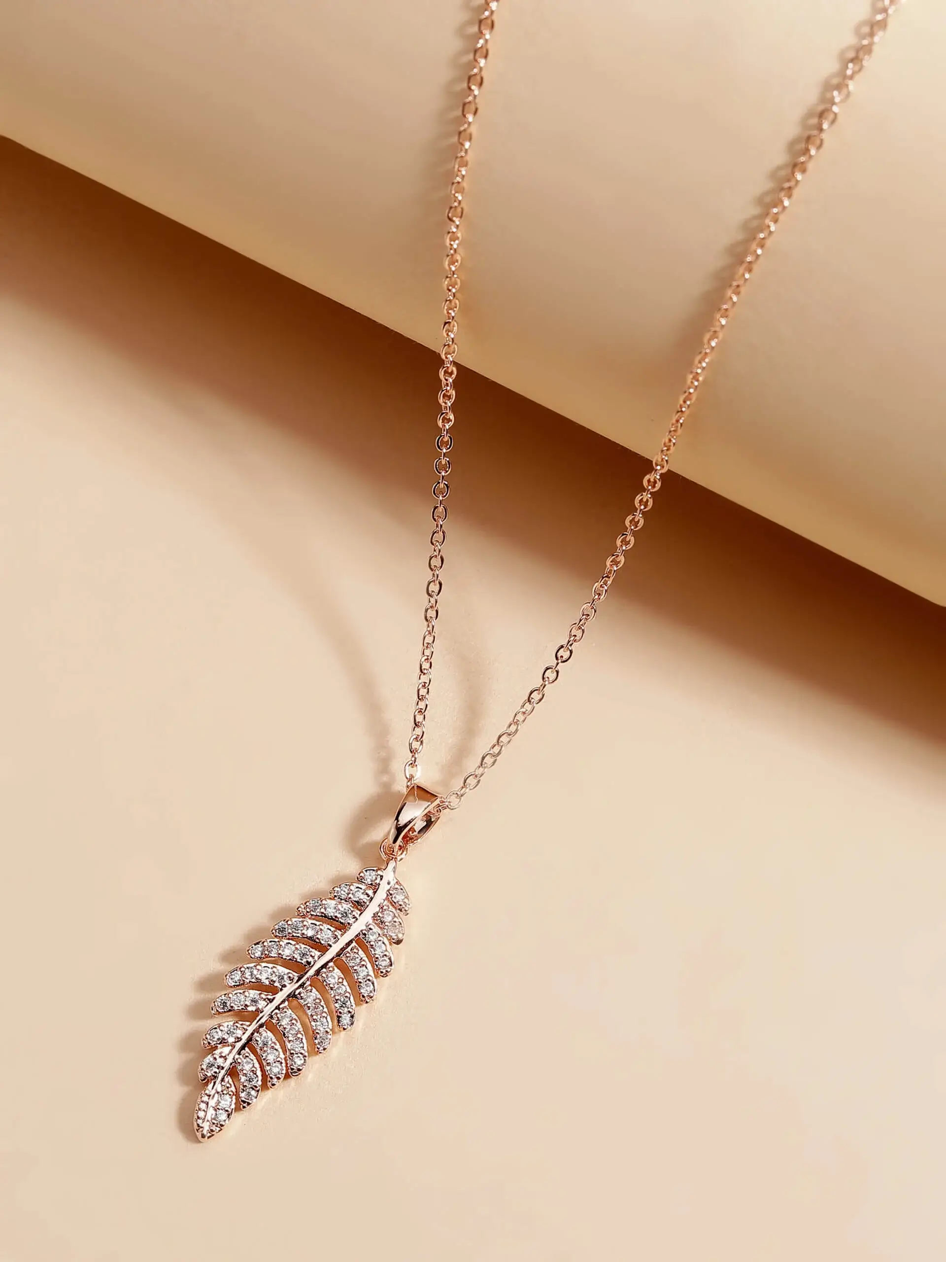 Feather Pendant Necklace and Earring Set - ARJW1015RG – ARCADIO